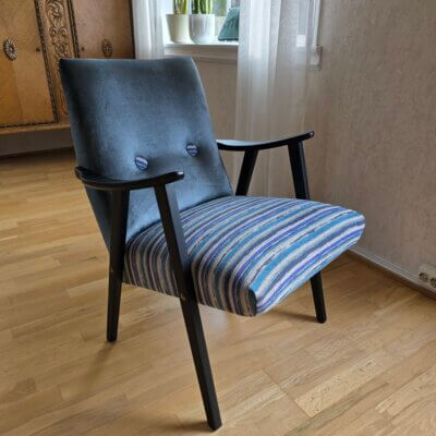 Lavrygget lenestol i klassisk skandinavisk stil